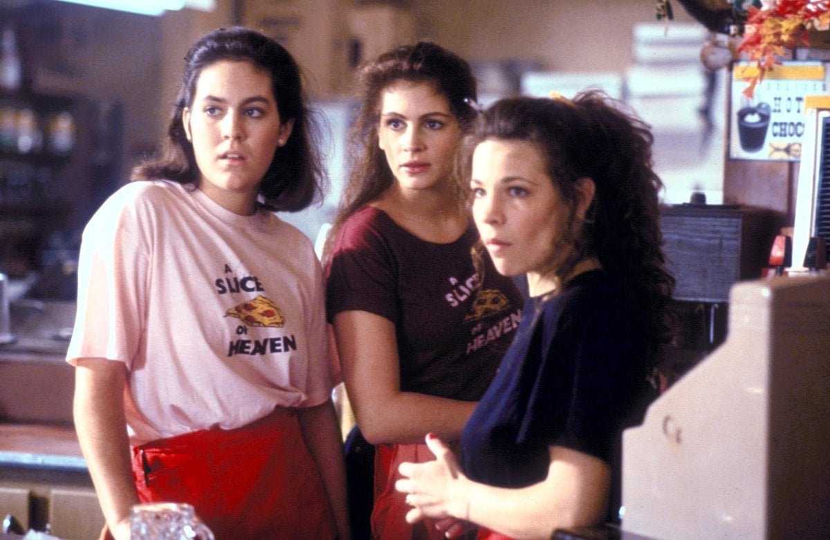 Annabeth Gish as Katherine "Kat" Araújo, Julia Roberts as Daisy Araújo, and Lili Taylor as Josefina "Jojo" Barbosa in the American romantic comedy-drama film Mystic Pizza