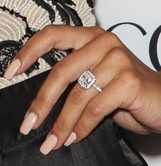 Naya Rivera's stunning cushion-cut diamond engagement ring is beautifully complemented by a halo of smaller diamonds