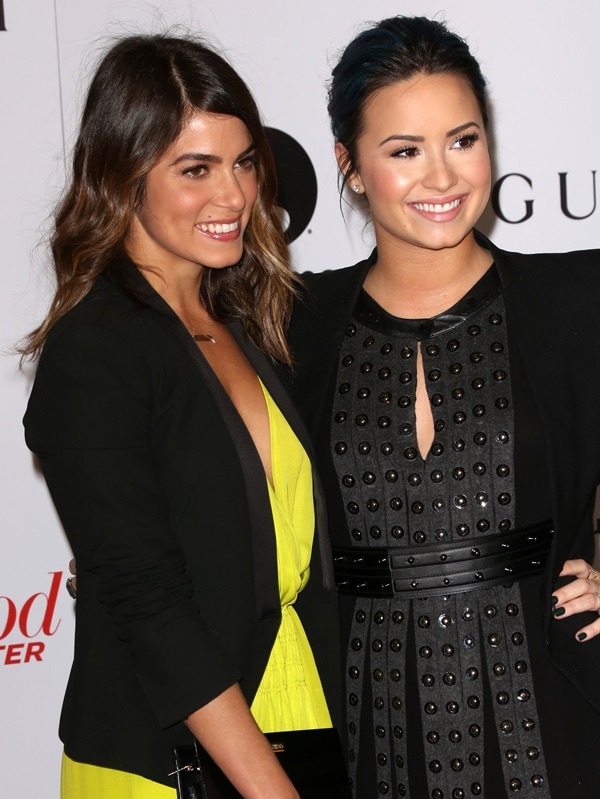 Demi Lovato appears taller than Nikki Reed due to her high heels, despite being shorter in height
