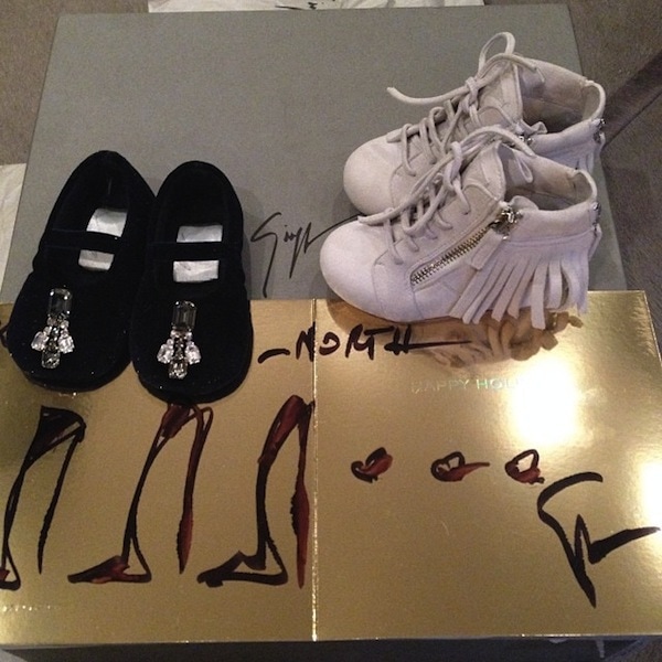 North West’s custom-made Giuseppe Zanotti shoes, including adorable black jeweled flats and white fringe booties, showcasing her one-of-a-kind designer collection from a young age