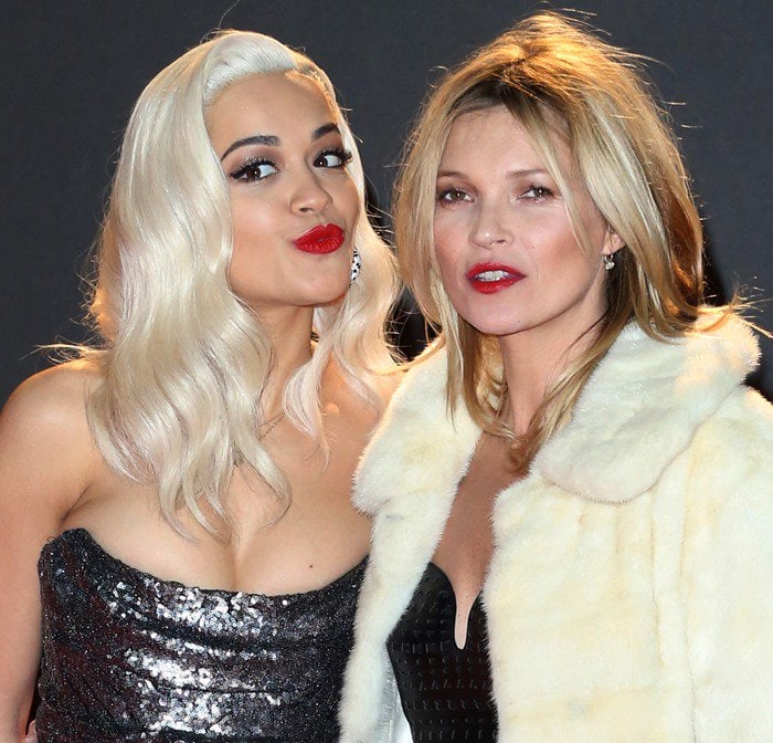 Rita Ora and Kate Moss pose for photos in matching red lipstick