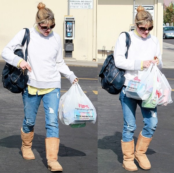Selma Blair embraced casual comfort with ripped jeans, a sweatshirt, and black UGG boots while running errands in Los Angeles on November 20, 2013