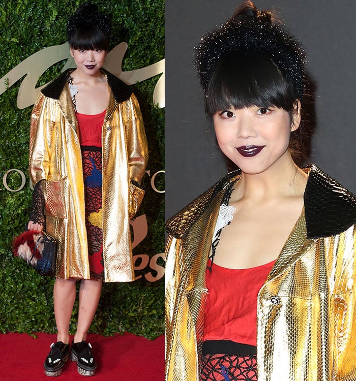 Susie Lau wears a flashy gold coat at the 2013 British Fashion Awards held December 2 in London