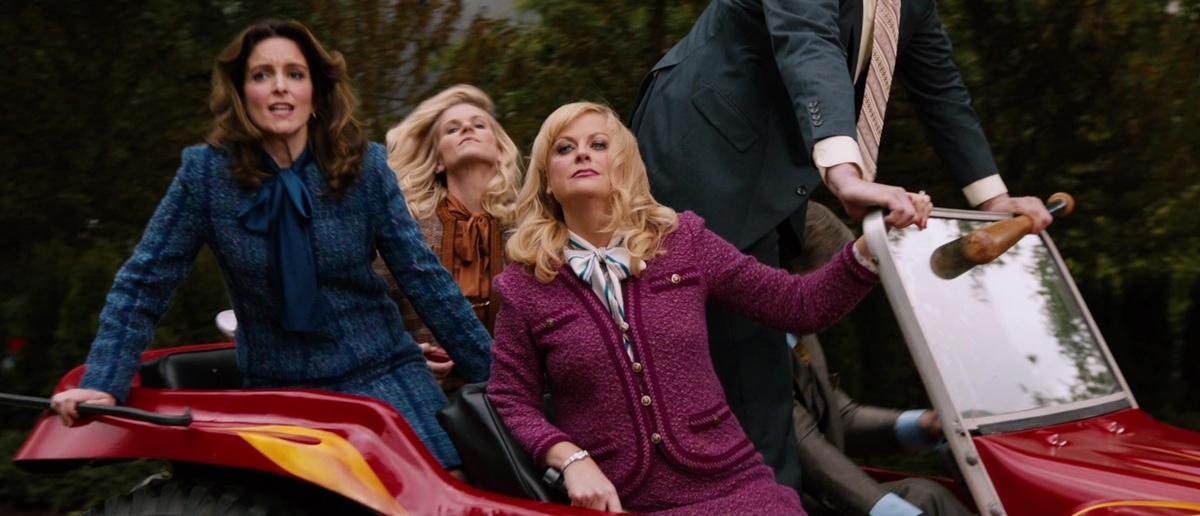 Tina Fey and Amy Poehler as Entertainment News anchors in the 2013 American comedy film Anchorman 2: The Legend Continues
