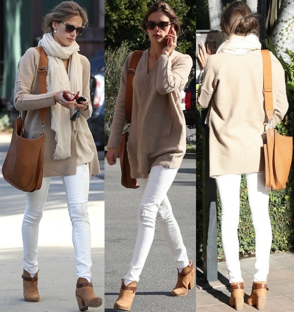 Alessandra Ambrosio in Santa Monica wearing a wool cardigan and white skinny jeans on December 10, 2013