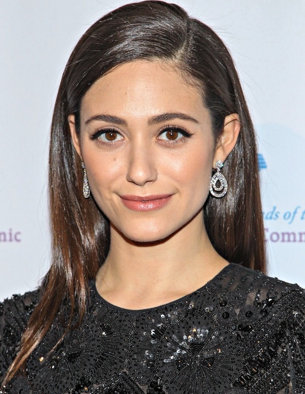 Emmy Rossum shows off her Chopard earrings on the red carpet