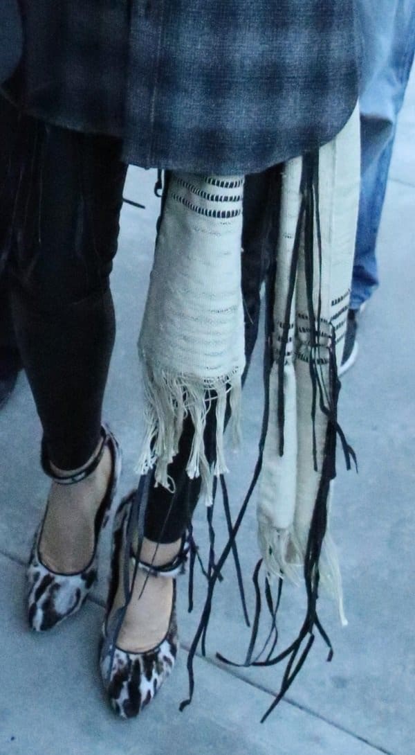 Fergie wearing a pair of animal-print pumps