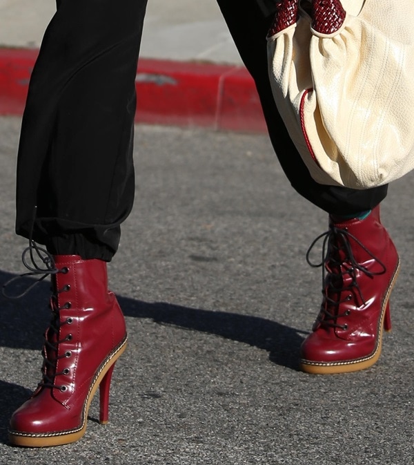 Gwen Stefani wears a pair of lace-up heeled "Nichol" booties