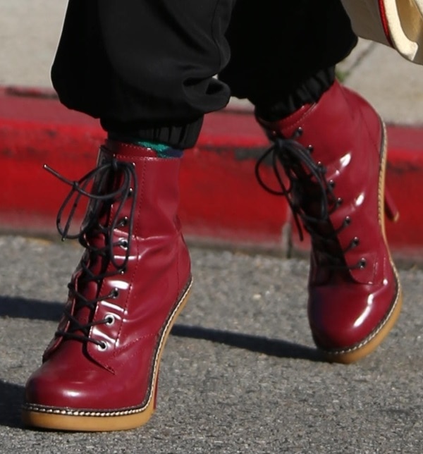 Gwen Stefani rocks a red pair of L.A.M.B. booties