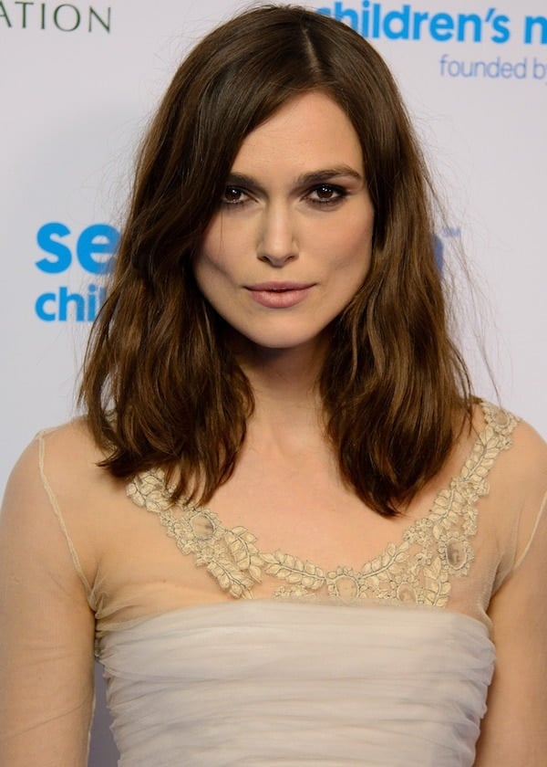 Keira Knightley's hair fell in soft waves around her shoulders