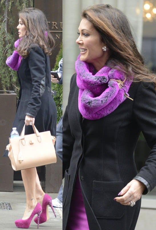 Lisa Vanderpump styled a purple dress with a matching scarf and a black coat