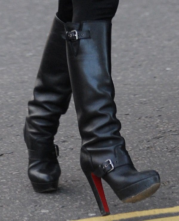 Myleene Klass shows off her high-heeld platform knee boots from Christian Louboutin