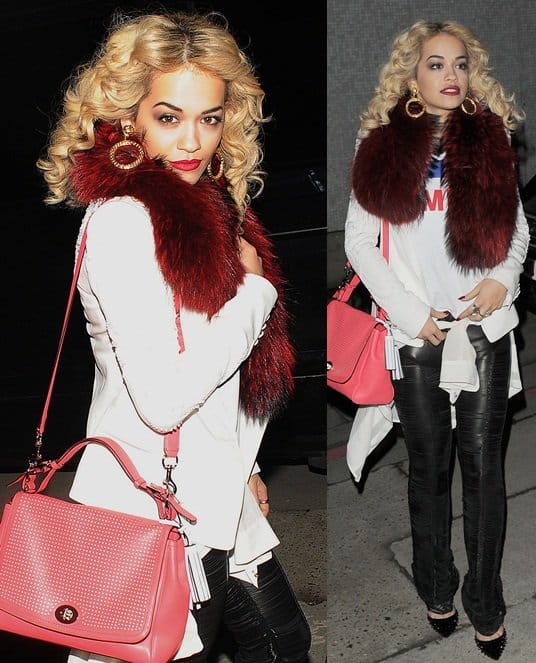 Rita Ora leaves a recording studio while decked in a colored fur scarf and leather pants