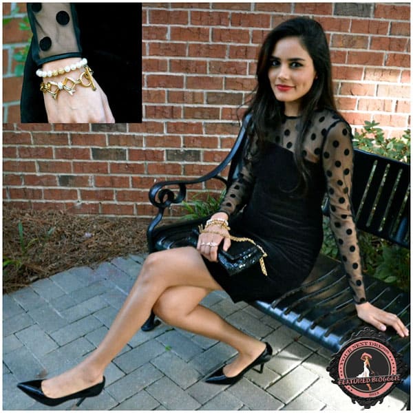 Alpa wears a black Juicy Couture velvet polka dot dress with matching Kenneth Cole pumps