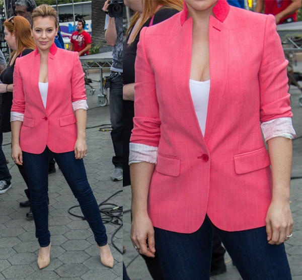 Alyssa Milano demonstrates the timeless appeal of combining a blazer with skinny jeans at the Grove, where she appeared on the entertainment show 'Extra!' with Mario Lopez in Los Angeles, on January 7, 2014