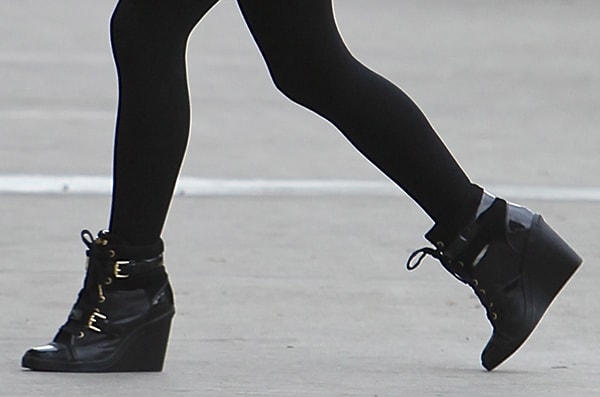 Ariana Grande wearing MICHAEL Michael Kors Skid wedge sneakers