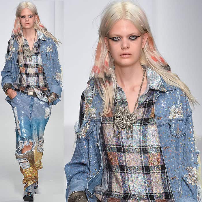 Miley Cyrus' denim jacket and jeans on the Ashish spring 2014 catwalk, shown during London Fashion Week in London, England, on September 14, 2013