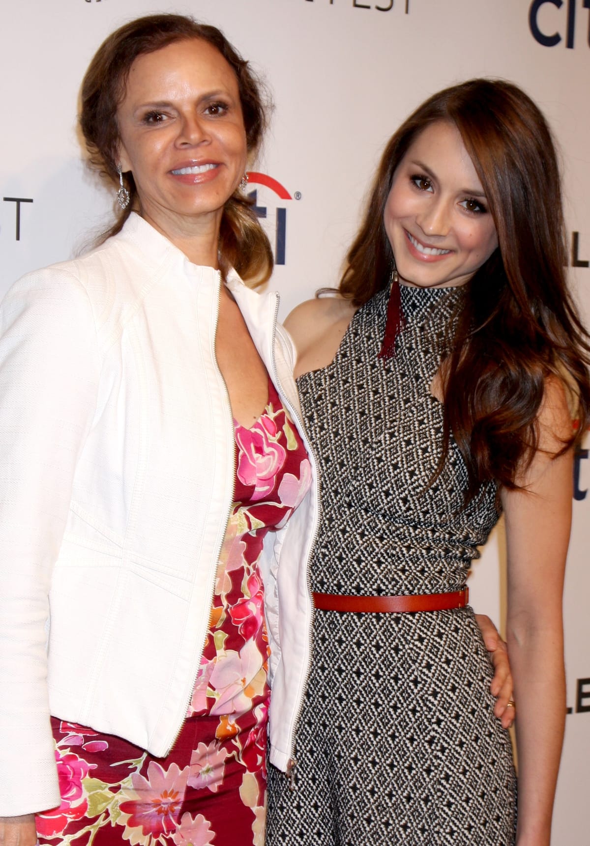 Deborah Pratt and Troian Bellisario, in a Charlotte Ronson dress, at 2014 PaleyFest