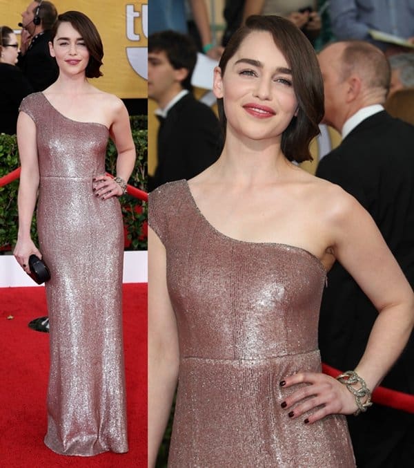 Emilia Clarke dazzles in a custom, one-shoulder, rose gold Calvin Klein Collection gown with a sleek, figure-hugging silhouette and subtle sparkle