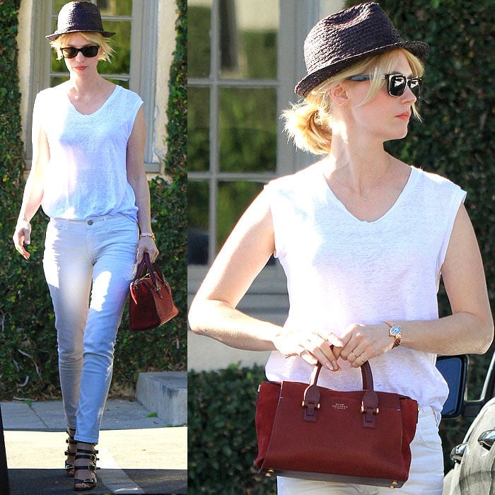 January Jones stepped out in a casual version of an all-white clothes plus black shoes outfit