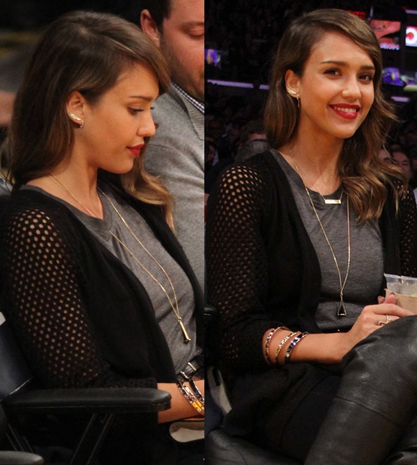 Jessica Alba was effortlessly stylish at the Lakers game, pairing her perforated cardigan with a gray top and layered necklaces