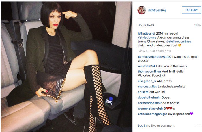Jessie J shows off her outfit in a car on her way to the BRIT awards nominations