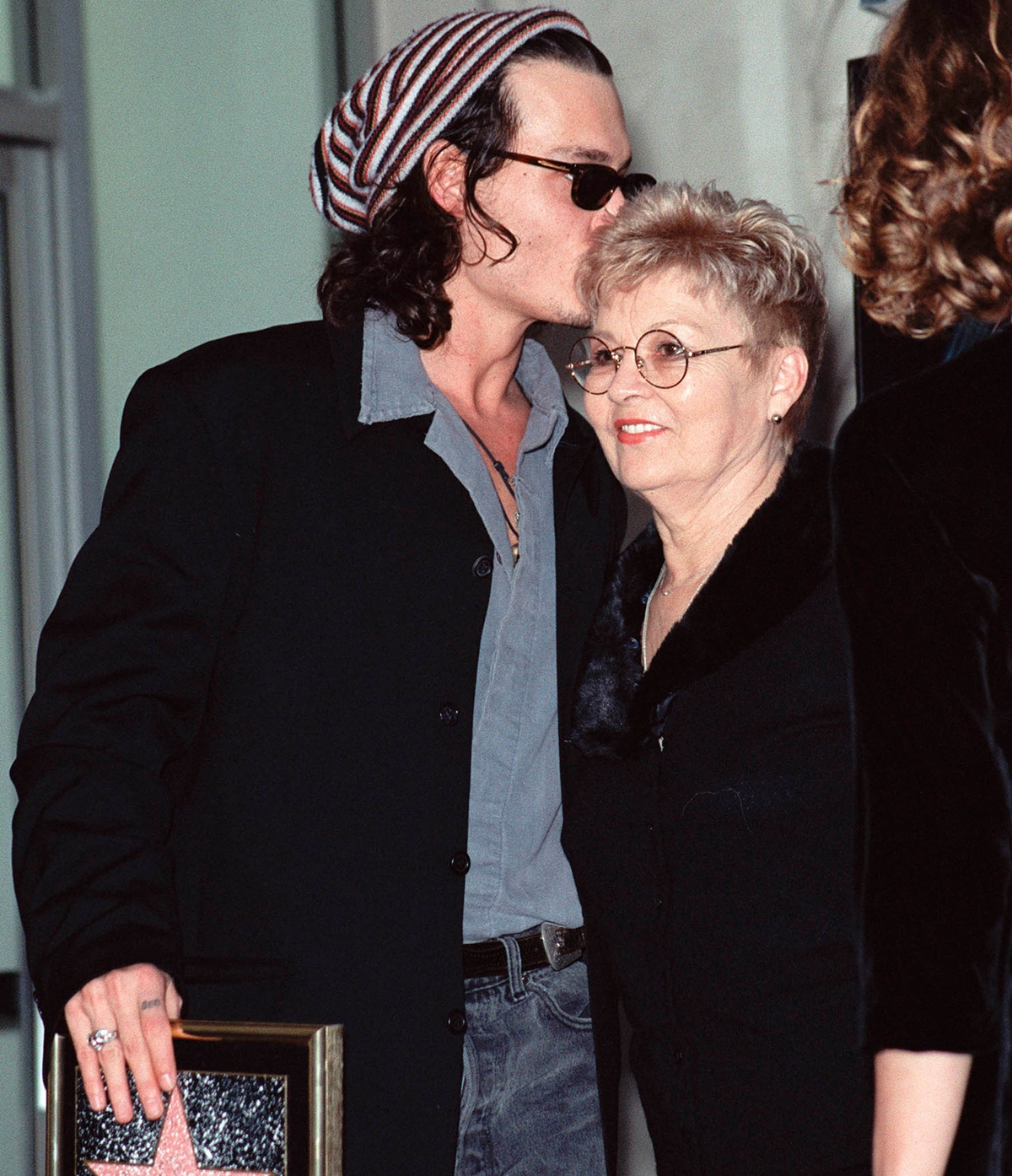 Johnny Depp says his mother Betty Sue Palmer was "violent" and "cruel" to him when growing up