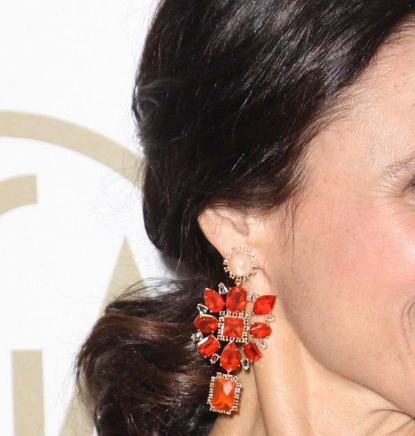 Julia Louis-Dreyfus styles her award ceremony ensemble with a pair of Irene Neuwirth earrings