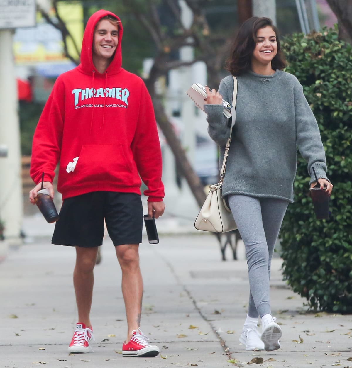 When she's not wearing high heels, Justin Bieber looks about the same height as Selena Gomez