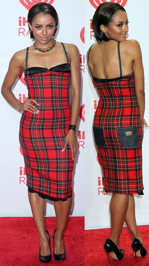 Kat Graham in a stunning plaid dress by Dolce & Gabbana and Casadei pumps