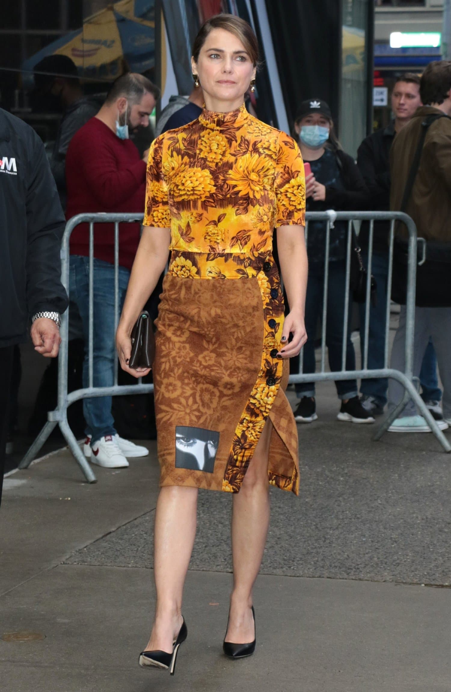 Keri Russell steps out in a golden Kwaidan Editions floral dress and a black pumps for an appearance on Good Morning America