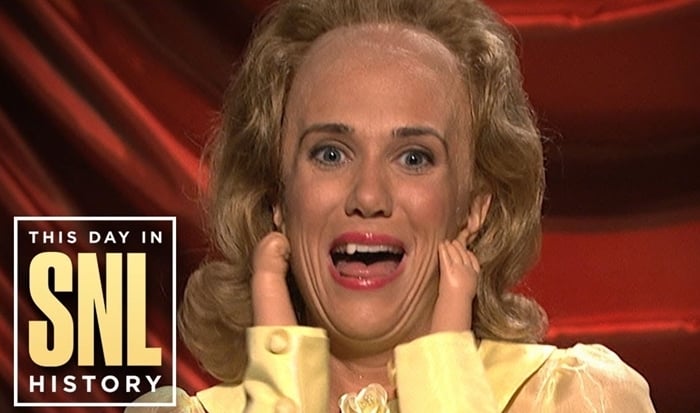 Kristen Wiig's Dooneese character on SNL has tiny hands, a big forehead, and a snaggletooth