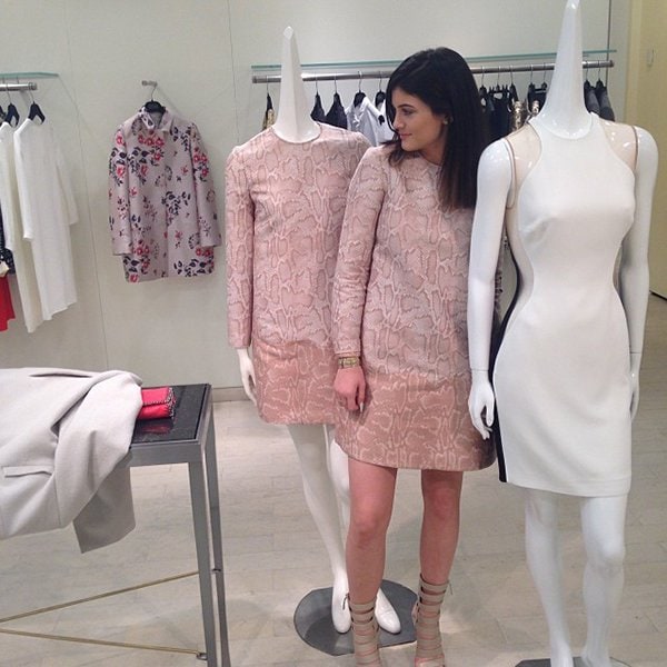 Kylie Jenner wearing a Stella McCartney python jacquard dress while shopping at Barneys New York