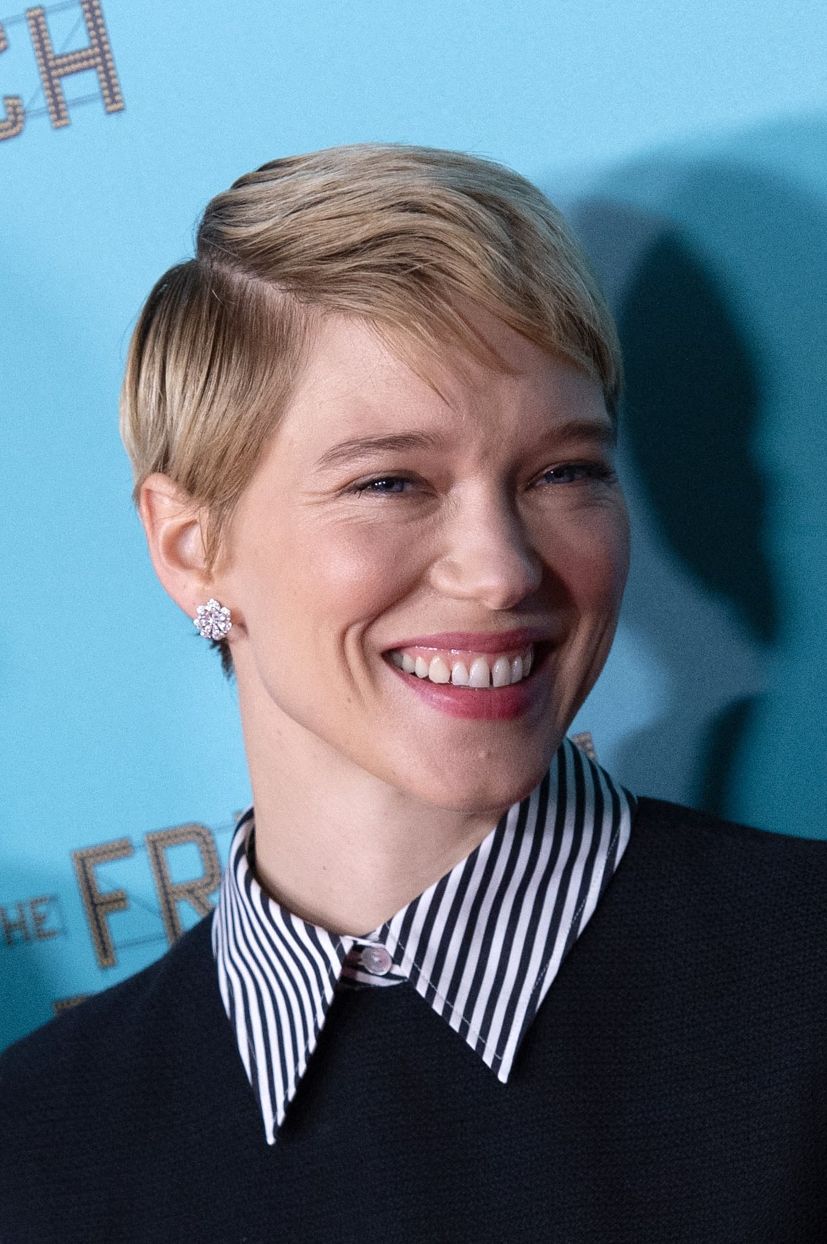 Lea Seydoux shows off her famous tooth gap at the "The French Dispatch" - Paris Gala Screening