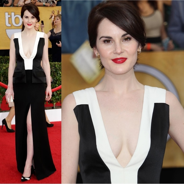 Michelle Dockery displayed both her cleavage and legs with an extremely low-cut neckline and a thigh-high slit