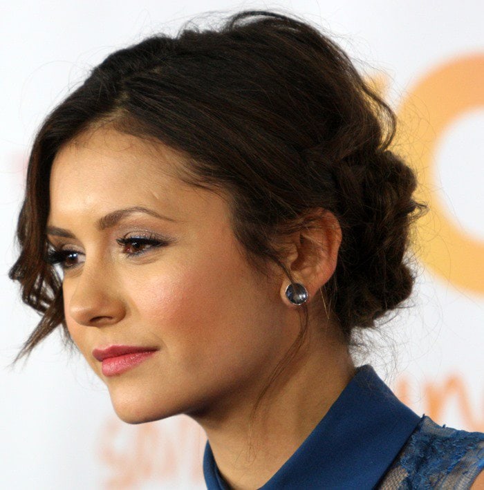Nina Dobrev with a soft updo and elegant makeup at the 2013 TrevorLIVE LA event