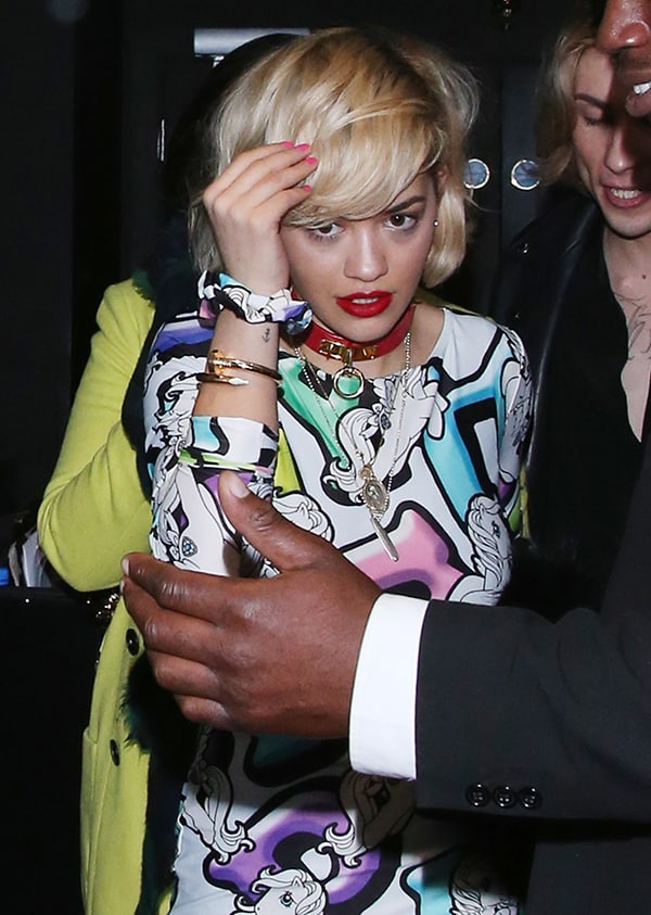 Rita Ora wearing a My Little Pony x Alice Vandy dress and bold red lipstick at Chinawhite Nightclub on January 4, 2014