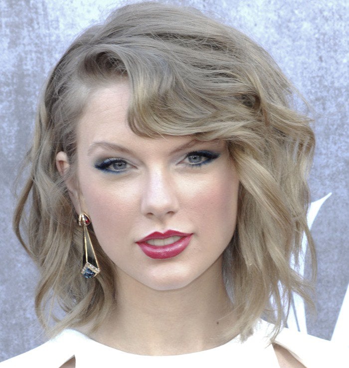 Taylor Swift wars her short hair in curls at the 49th annual Academy of Country Music Awards