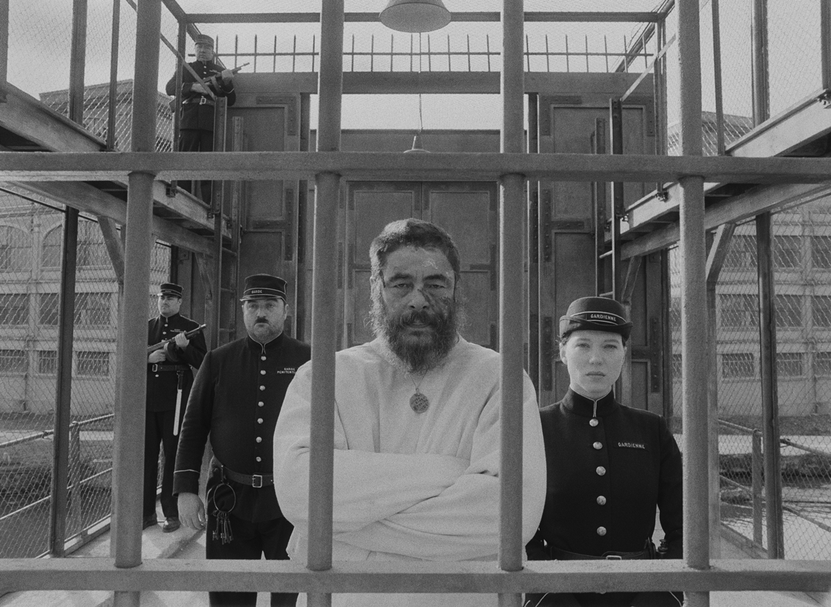 Benicio del Toro as incarcerated artist Moses Rosenthaler, Denis Menochet as a prison guard, and Léa Seydoux as Simone in the 2021 American anthology comedy-drama film The French Dispatch of the Liberty, Kansas Evening Sun, or simply The French Dispatch