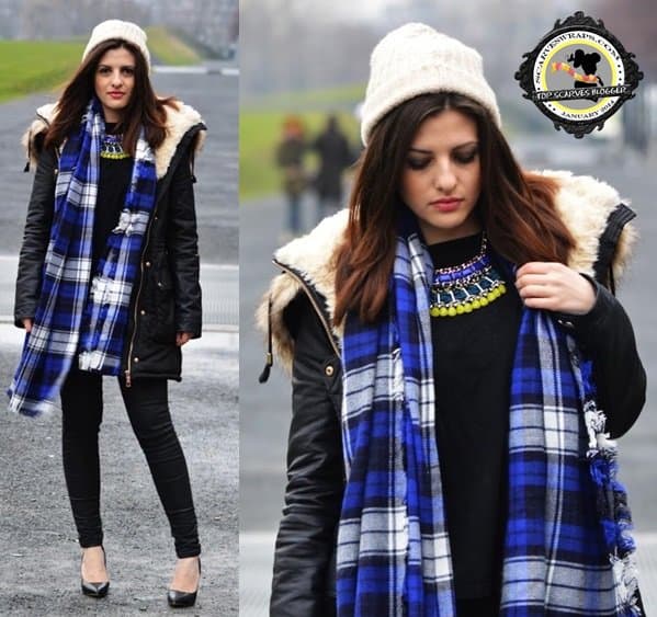 Hannah wears a beautiful blue tartan scarf