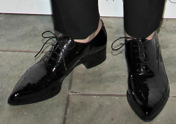 Evan Rachel Wood's feet in black patent leather Christian Louboutin brogues