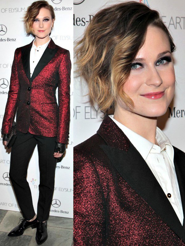 Evan Rachel Wood sweeps her hair to one side as she attends Art of Elysium's seventh annual Heaven Gala