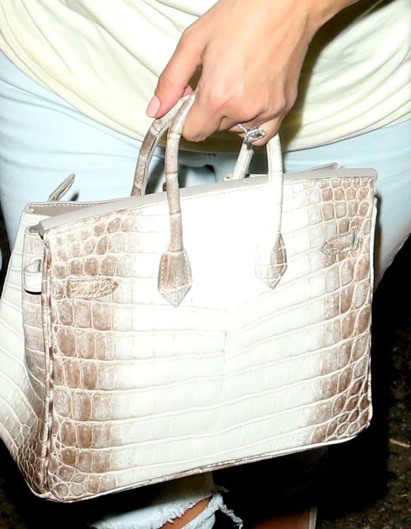 Close-up of Kim Kardashian's stylish ombré mini croc-embossed Hermes handbag