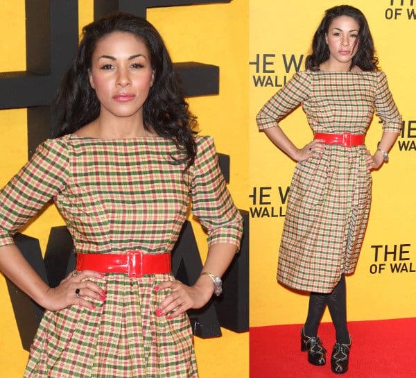 Actress Kathryn Drysdale in a black-and-yellow plaid dress and cutout heeled Oxfords at the premiere of The Wolf of Wall Street at the Odeon Leicester Square in London, England, on January 9, 2014