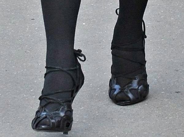 Kim Kardashian wears black lace-up heels out in Paris
