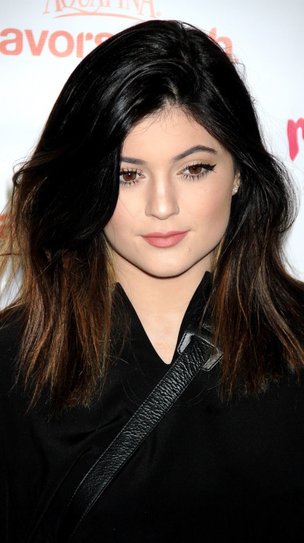 Kylie Jenner going simple and understated in all-black as she attends PepsiCo's Super Bowl celebration