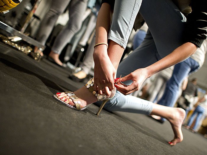 model trying on shoes