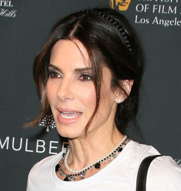 Sandra Bullock wore Burberry Prorsum at the BAFTA LA 2014 Awards Season Tea Party with a big jewel necklace