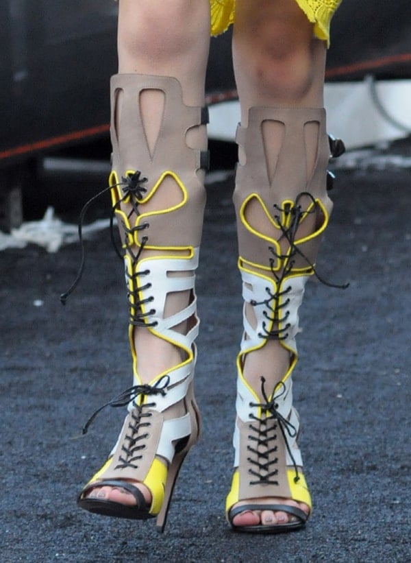 Bella Thorne's feet in colorful yellow "Rita" sandals
