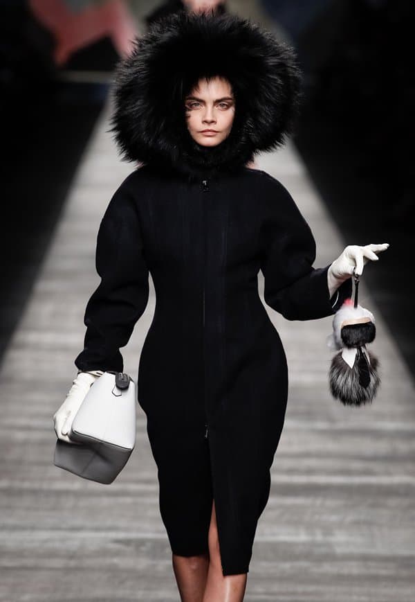 Cara Delevingne walking the runway of Fendi's Autumn/Winter 2014 show